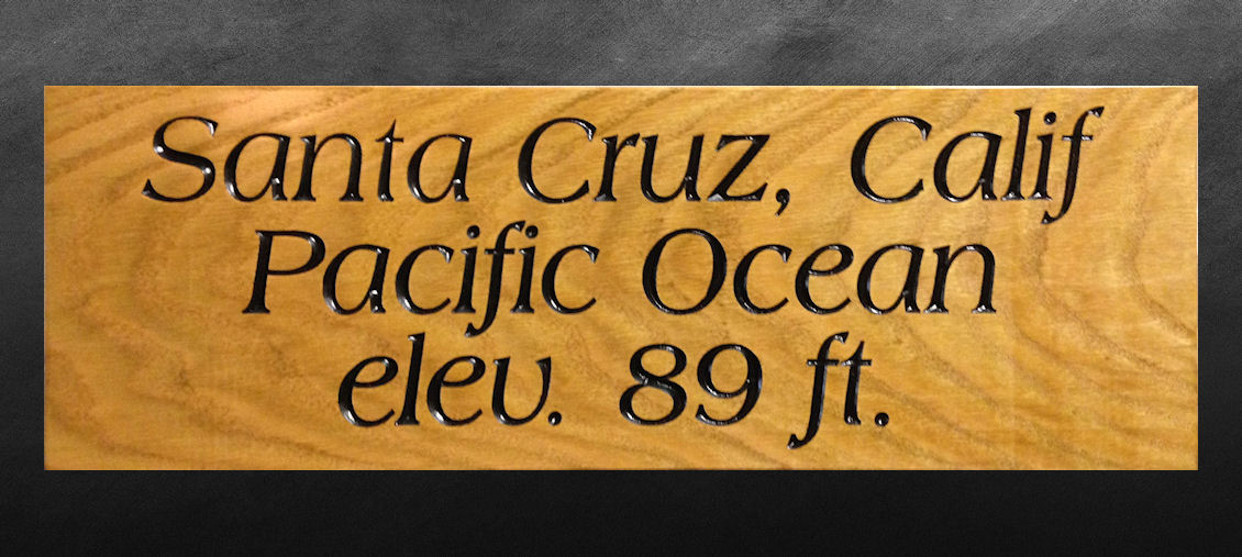 24 X 8 Oak sign with black cuts.