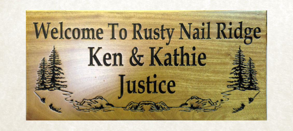 24 X 11 Mahogany sign with black cuts.